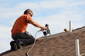 Roofing Company Adding Shingles